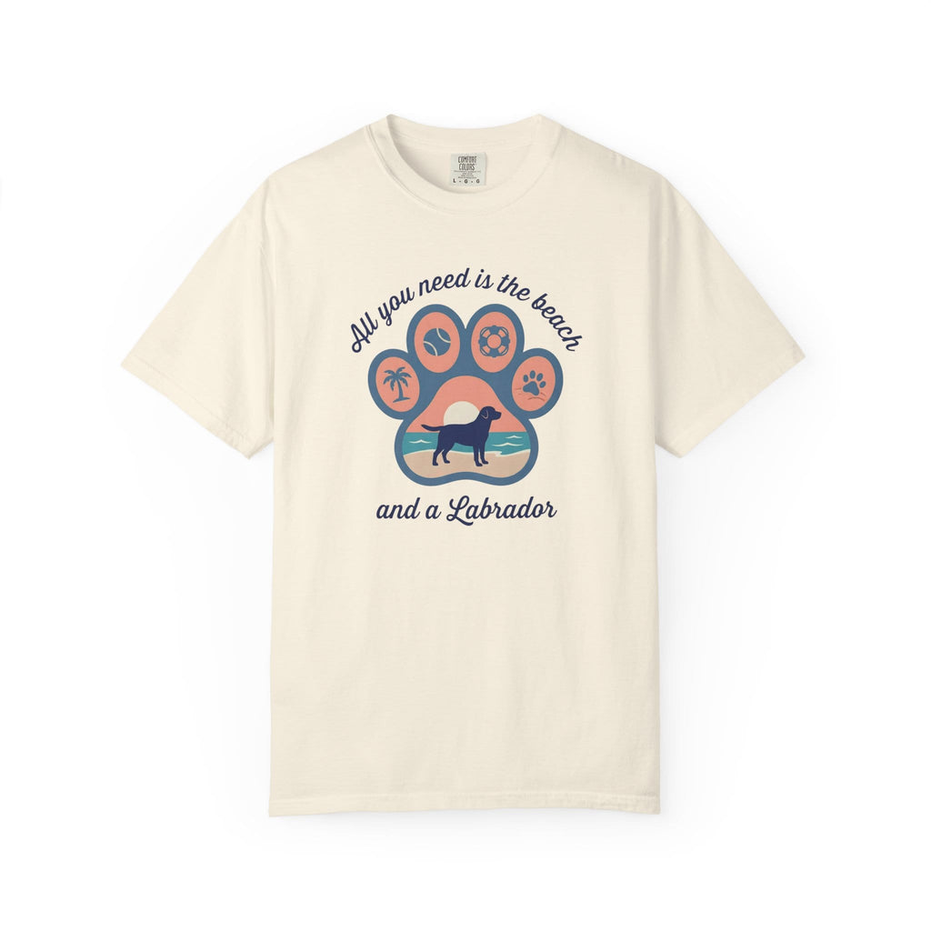 Cream graphic t-shirt featuring a Labrador and beach-themed design, perfect for dog lovers and casual wear.
