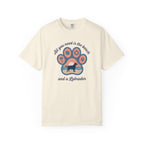 Cream graphic t-shirt featuring a Labrador and beach-themed design, perfect for dog lovers and casual wear.