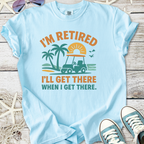 Light blue cotton t-shirt with fun retired golf cart graphic and text, perfect for casual wear.