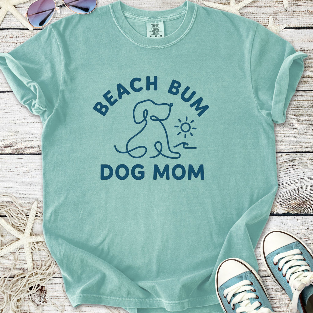 A teal cotton t-shirt featuring 'Beach Bum Dog Mom' graphic, ideal for pet lovers.