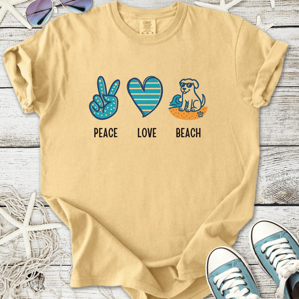 Beige graphic t-shirt featuring 'Peace Love Beach' design with playful icons, perfect for casual summer wear.