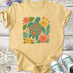 Yellow casual t-shirt with turtle and floral embroidery design, perfect for beach lovers.