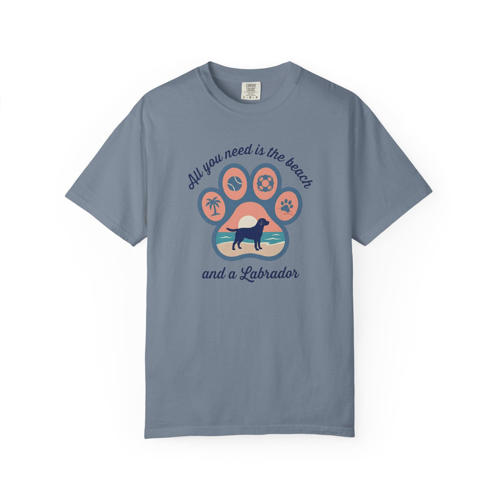 Light blue t-shirt featuring a Labrador graphic, beach theme, and playful text design.