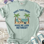 Light blue t-shirt with 'Does this shirt make me look retired?' graphic, comfortable cotton material.