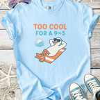 Light blue t-shirt featuring a cool duck lounging with sunglasses, perfect for casual summer wear.