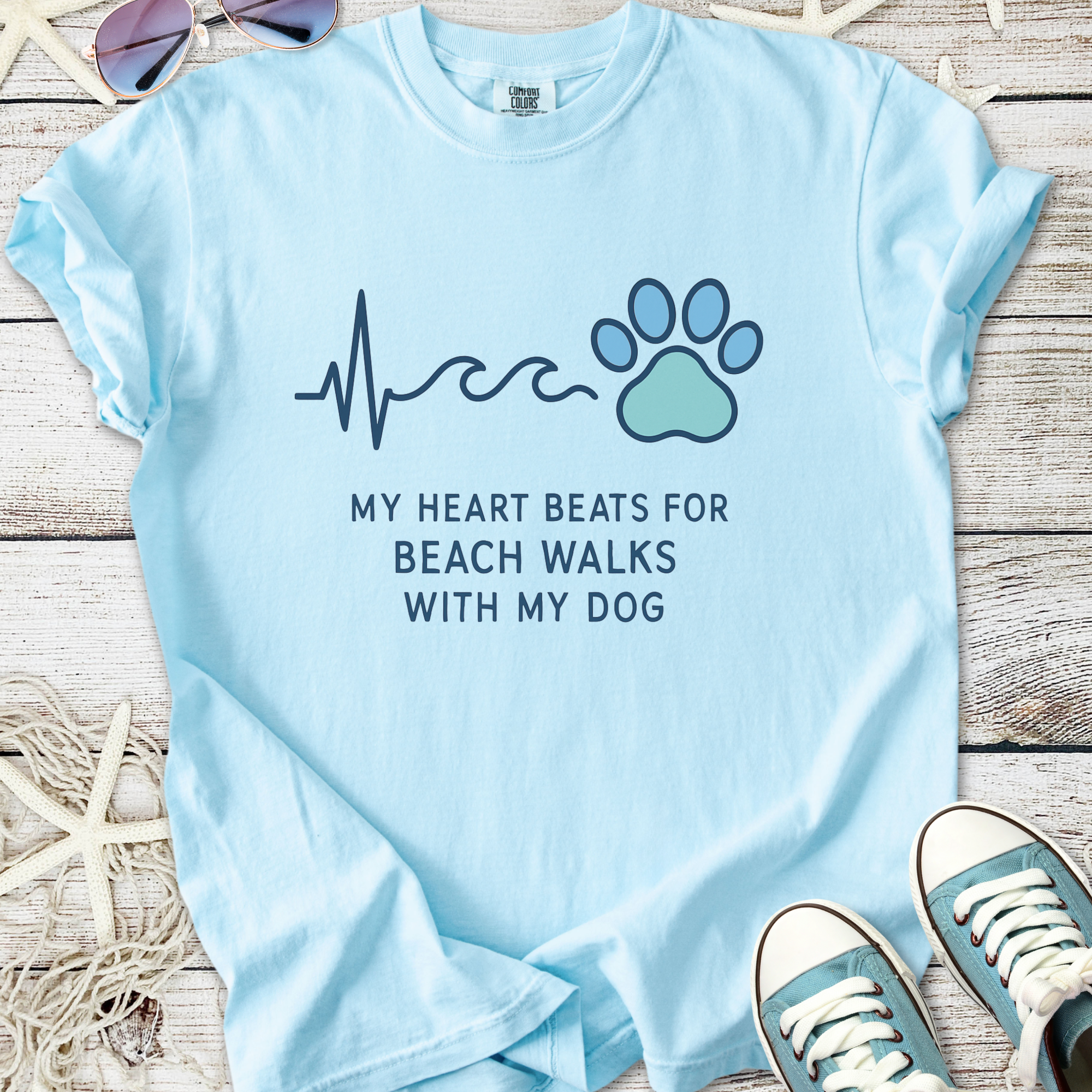 Light blue graphic tee featuring 'My Heart Beats for Beach Walks with My Dog' design, perfect for dog lovers.