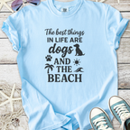 Sky blue cotton T-shirt with dog and beach-themed graphic design, perfect for dog lovers and summer outings.