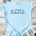 Light blue t-shirt with 'Retirement Crew' and animal graphics, perfect for relaxed retired lifestyle.