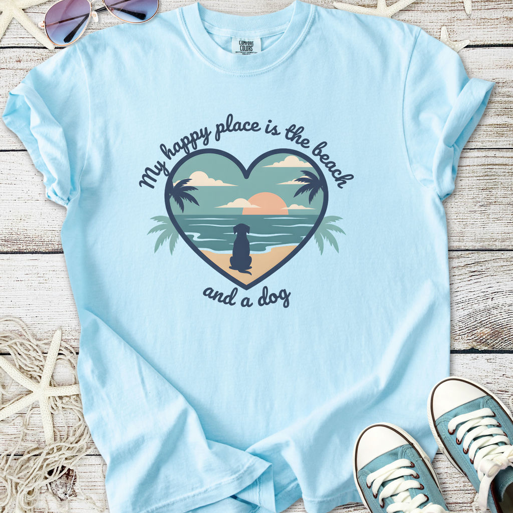 Light blue t-shirt featuring a heart design with beach scene and dog illustration.