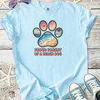 Light blue t-shirt with 'Proud Parent of a Beach Dog' graphic, featuring beach-themed paw print design.