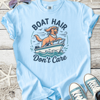 Light blue t-shirt with 'Boat Hair Don't Care' graphic featuring a dog on a boat.
