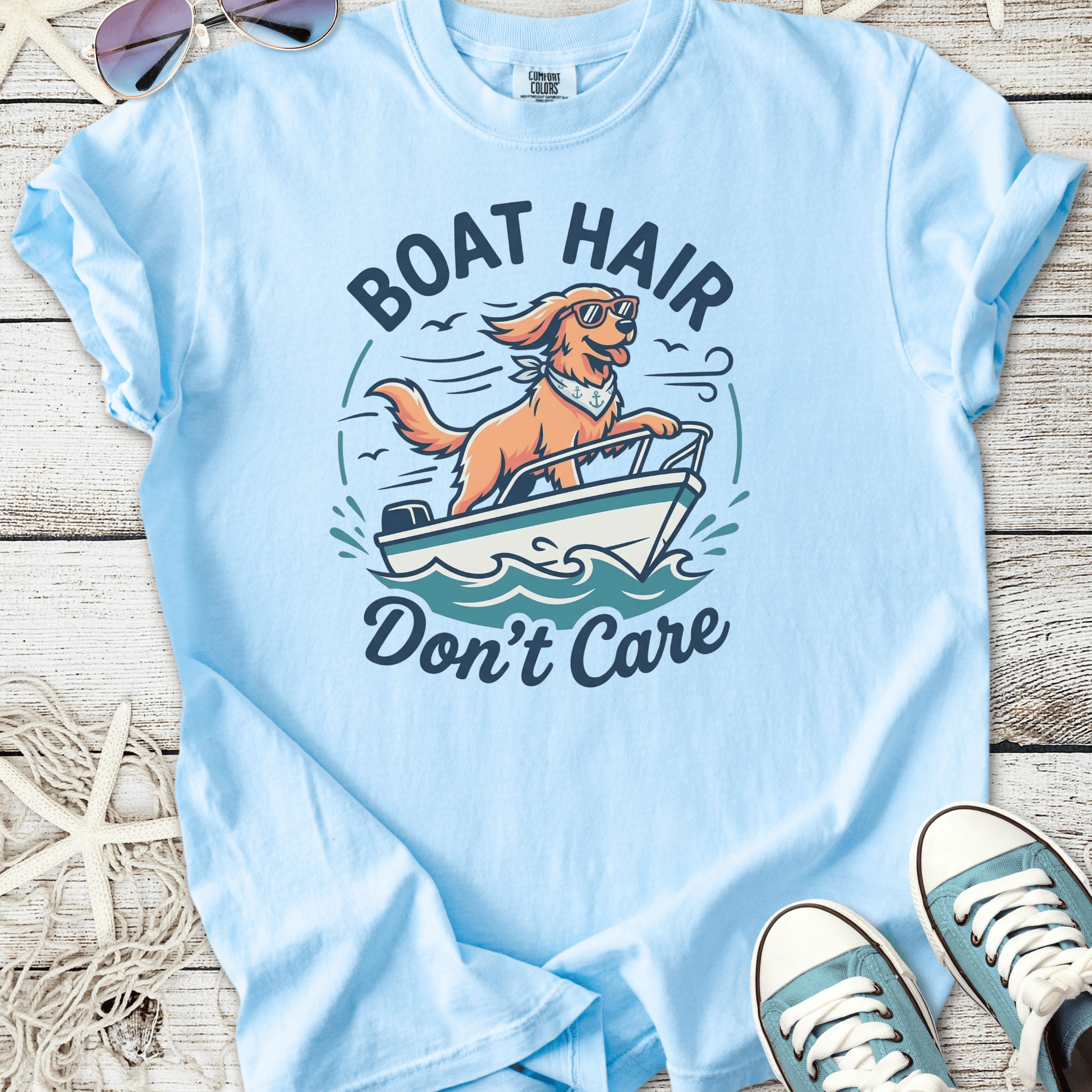 Light blue t-shirt with 'Boat Hair Don't Care' graphic featuring a dog on a boat.