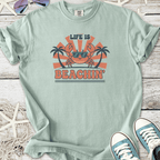 Mint green 'Life is Beachin'' graphic t-shirt featuring a cool crab and palm trees design.