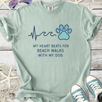 Mint green t-shirt with 'My heart beats for beach walks with my dog' slogan and paw print design.