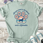 Light teal t-shirt with beach-themed Labrador graphic and quote, perfect for dog lovers.