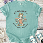 Mint green t-shirt featuring a vintage beach scene and fun text for summer adventures.