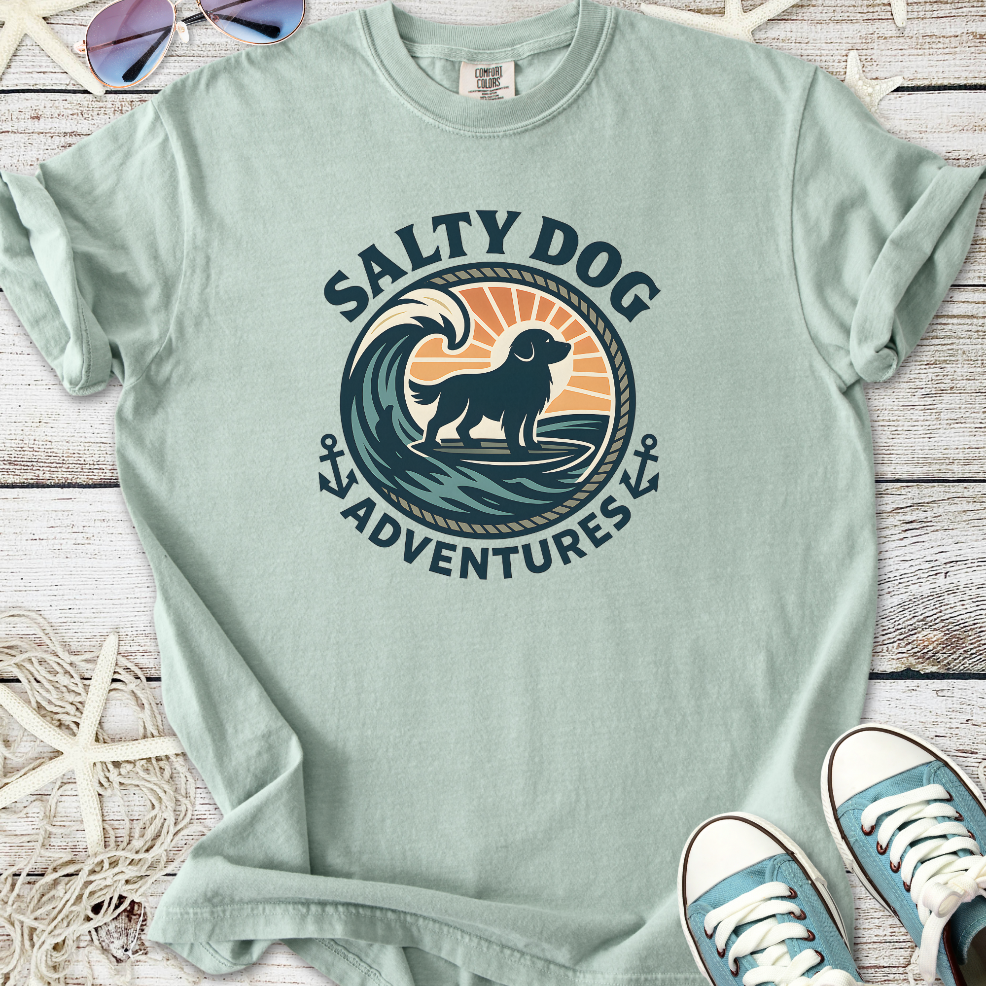 Light green 'Salty Dog Adventures' graphic t-shirt featuring a dog and wave design.