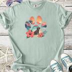 Light green t-shirt featuring a colorful dog paw design with beach and floral elements.