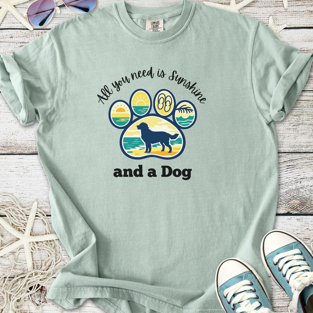 Light green t-shirt with dog paw print graphic and 'All you need is sunshine and a Dog' slogan.