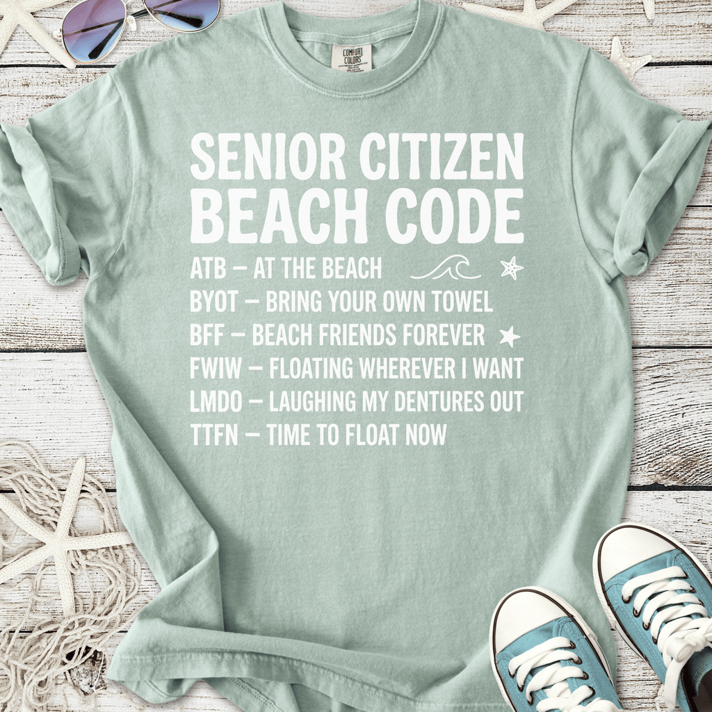 Mint green t-shirt with 'Senior Citizen Beach Code' graphic, perfect for beach lovers and fun outings.