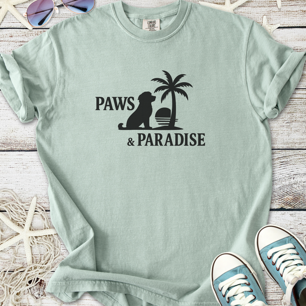 Mint green t-shirt with 'Paws & Paradise' graphic, featuring a dog silhouette and palm tree design.
