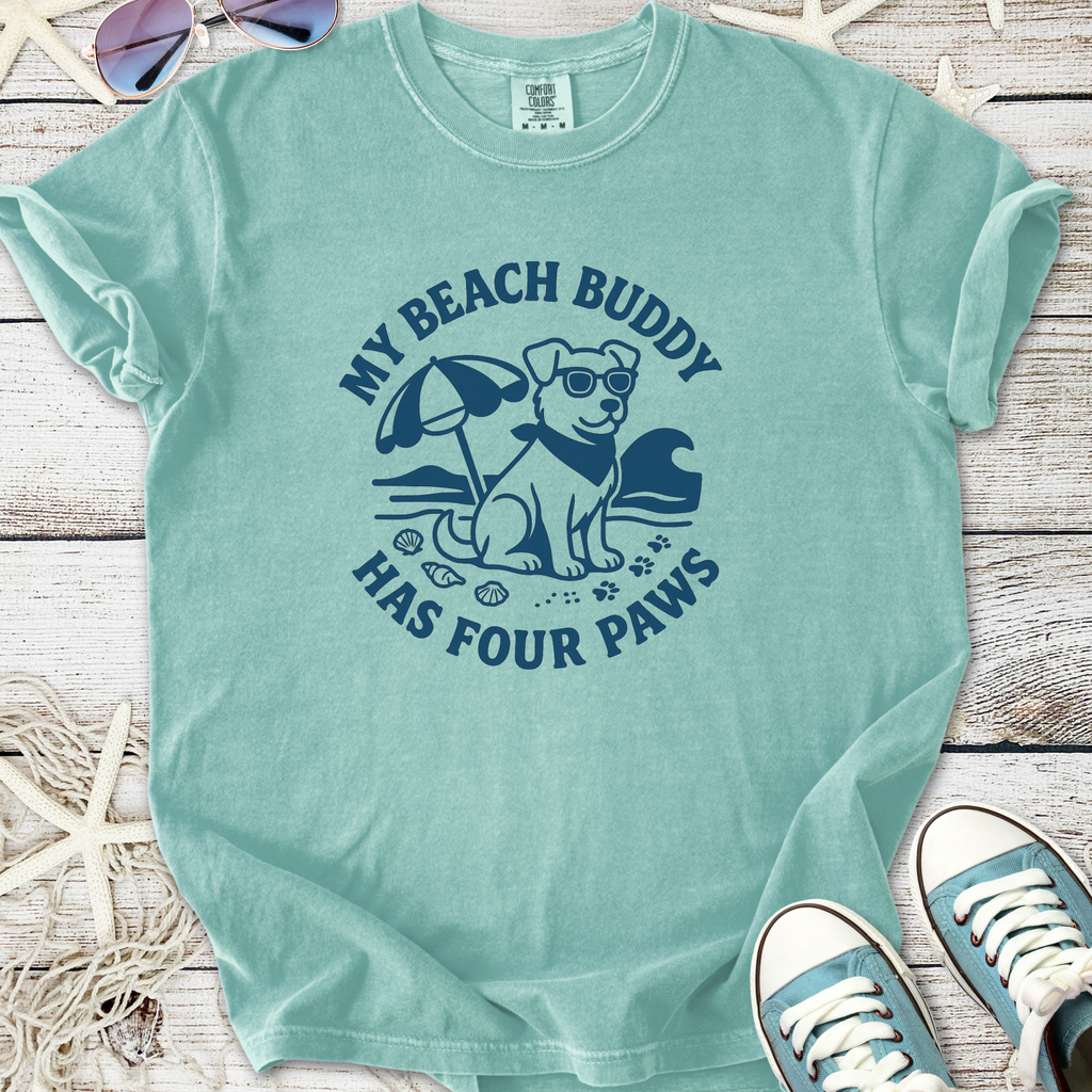 Mint green t-shirt featuring a playful dog in sunglasses and beach graphics, perfect for dog lovers.