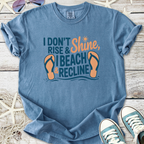 Blue graphic t-shirt with fun beach slogan and flip flop design, ideal for summer lounging.