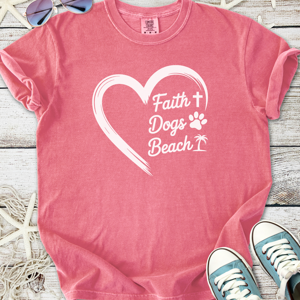 Pink t-shirt with 'Faith, Dogs, Beach' graphic design, perfect for casual summer outings.
