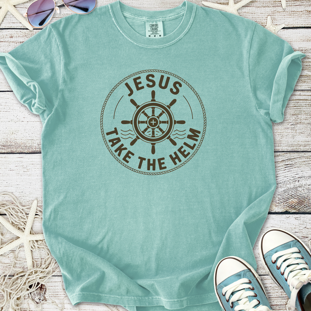 Light teal t-shirt with 'Jesus Take the Helm' graphic, made from soft cotton for comfort and style.