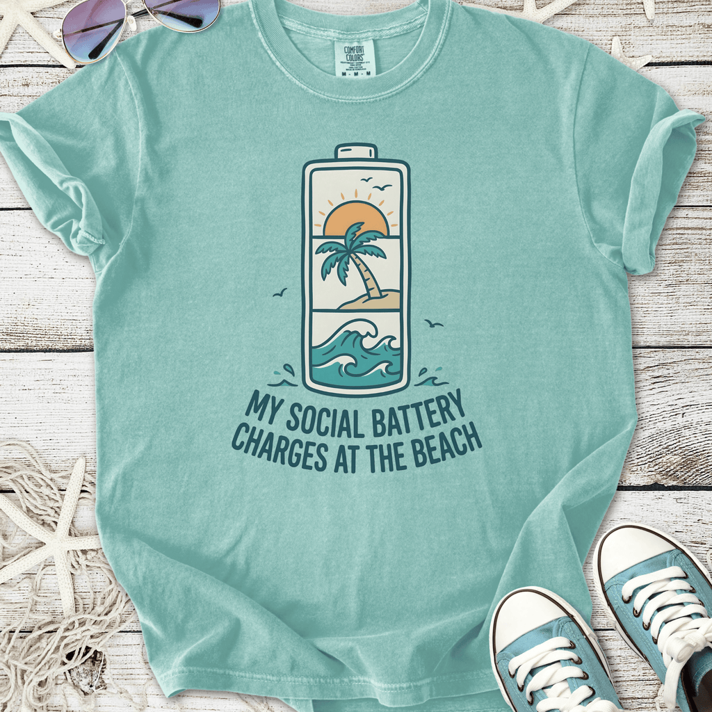Turquoise t-shirt with beach-themed graphic saying 'My Social Battery Charges at the Beach'