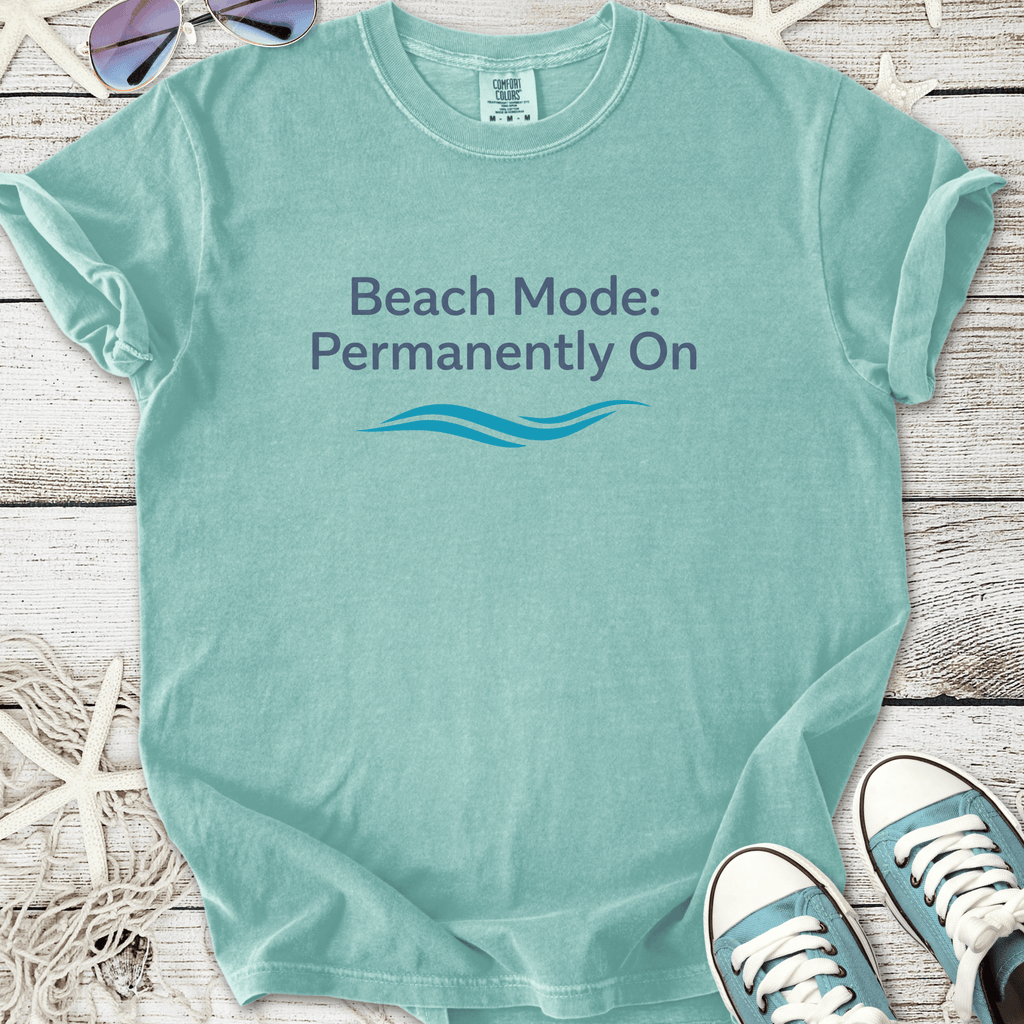 Light blue t-shirt with "Beach Mode: Permanently On" printed design, perfect for summer leisure.