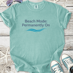 Light blue t-shirt with "Beach Mode: Permanently On" printed design, perfect for summer leisure.