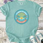 Mint green cotton t-shirt with 'Vitamin Sea Daily' graphic, perfect for beach lovers and summer vibes.