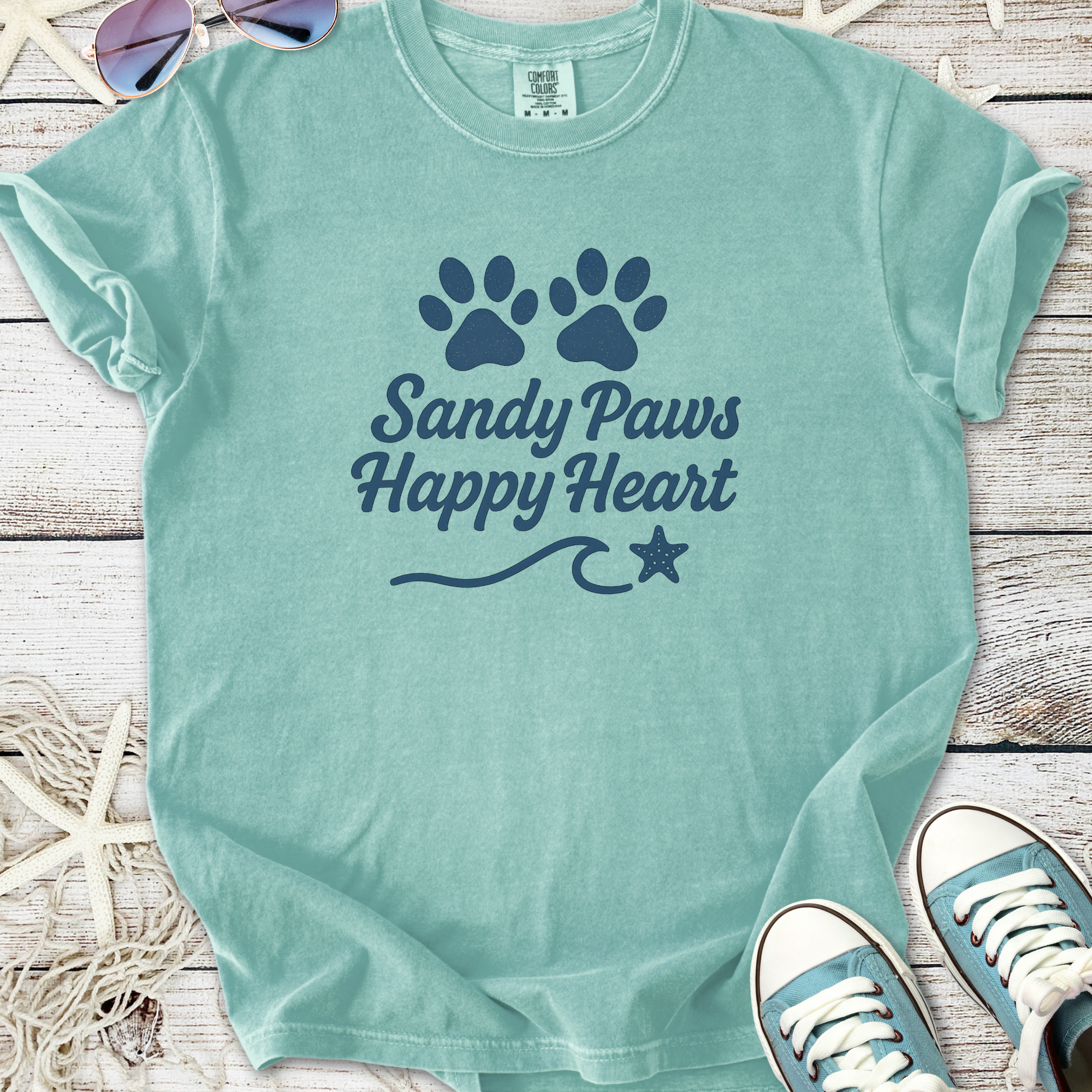 Mint green t-shirt with 'Sandy Paws Happy Heart' design, featuring paw prints and a star.