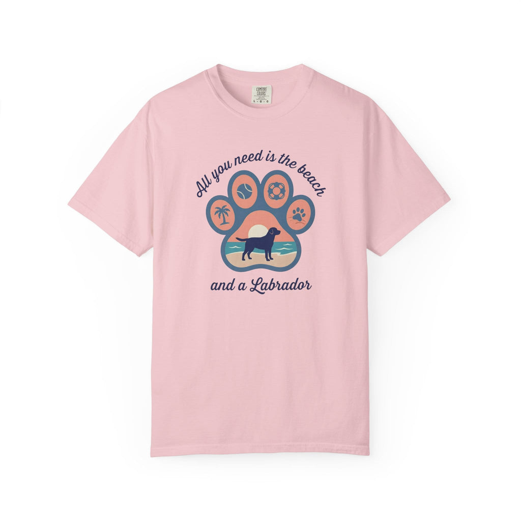 Pink t-shirt with 'All you need is the beach and a Labrador' graphic, featuring a paw print design.