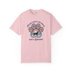 Pink t-shirt with 'All you need is the beach and a Labrador' graphic, featuring a paw print design.