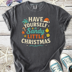 Dark gray graphic t-shirt with 'Have Yourself a Sandy Little Christmas' print, perfect for festive beach lovers.