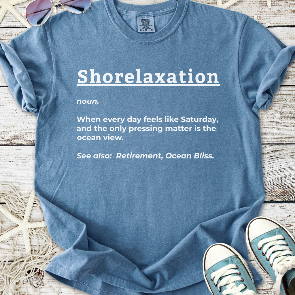 Blue cotton t-shirt with 'Shorelaxation' print, perfect for beach lovers and relaxed vibes.