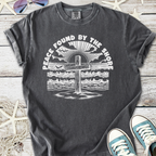 Gray cotton t-shirt with 'Peace Found By The Shore' graphic, perfect for beach lovers and casual wear.