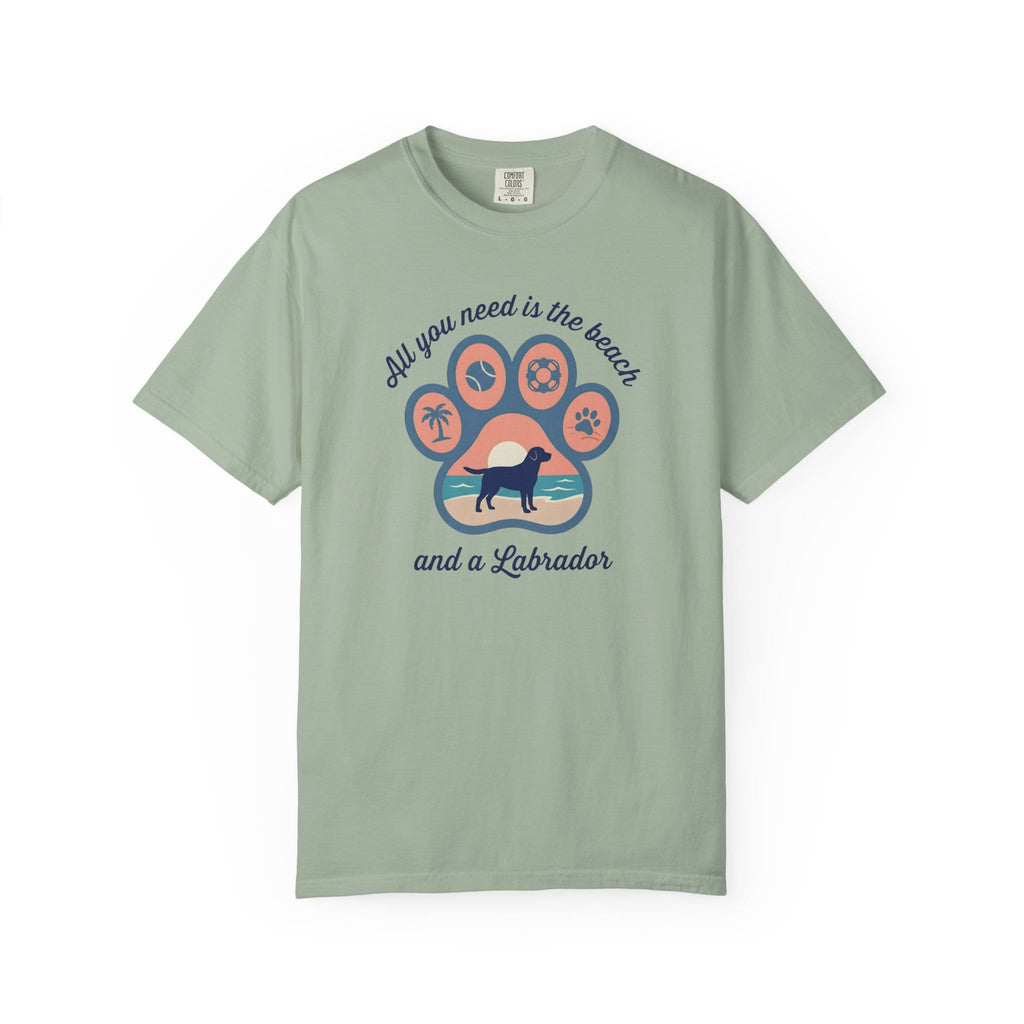 Light green t-shirt featuring 'All you need is the beach and a Labrador' graphic design.