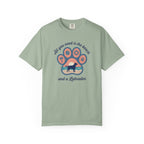 Light green t-shirt featuring 'All you need is the beach and a Labrador' graphic design.