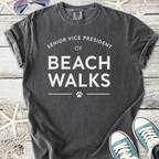 Gray cotton t-shirt with 'Senior Vice President of Beach Walks' text design, perfect for casual wear.
