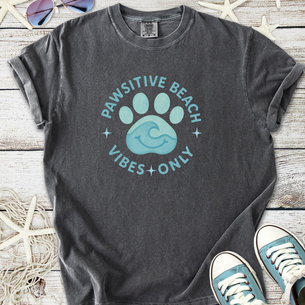 Gray unisex t-shirt featuring 'Pawsitive Beach Vibes Only' design with a paw print graphic.
