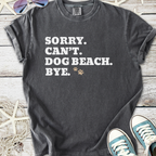 Gray graphic t-shirt with 'Sorry. Can't. Dog Beach. Bye.' text, perfect for dog lovers and beach outings.