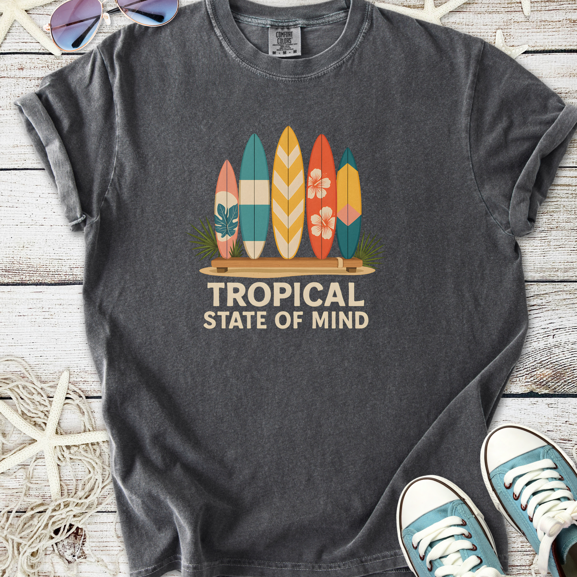 Gray short-sleeve t-shirt with 'Tropical State of Mind' and colorful surfboard graphic design.