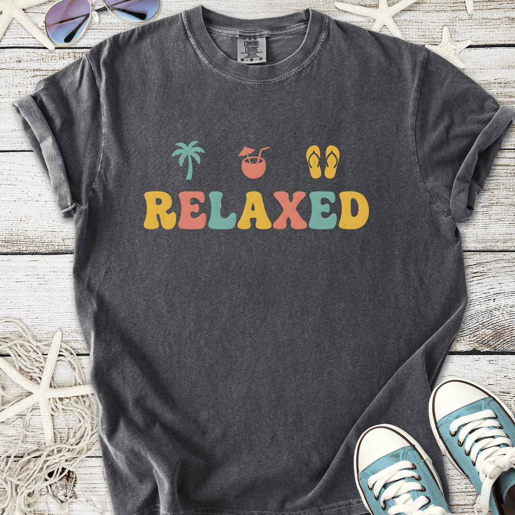 Charcoal relaxed fit t-shirt with colorful beach-themed designs, featuring palm tree and flip-flops.