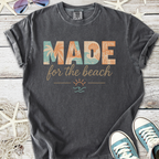 Charcoal gray t-shirt with 'MADE for the beach' design, featuring tropical graphics and a casual fit.