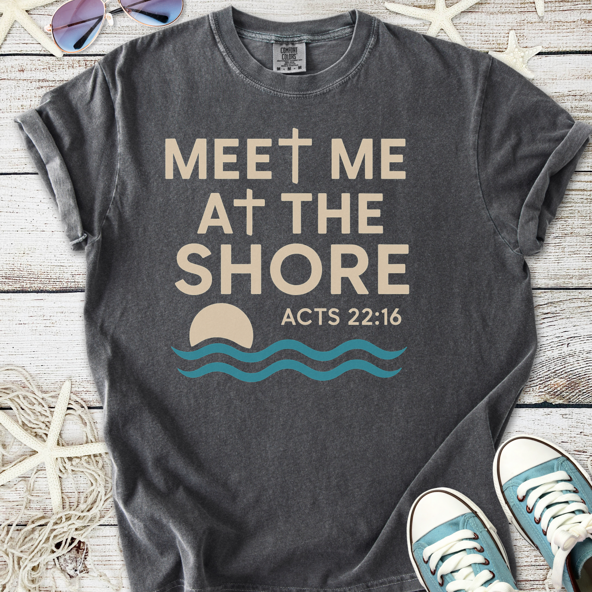 Charcoal gray t-shirt with 'Meet Me at the Shore' design featuring a cross and wave graphics.