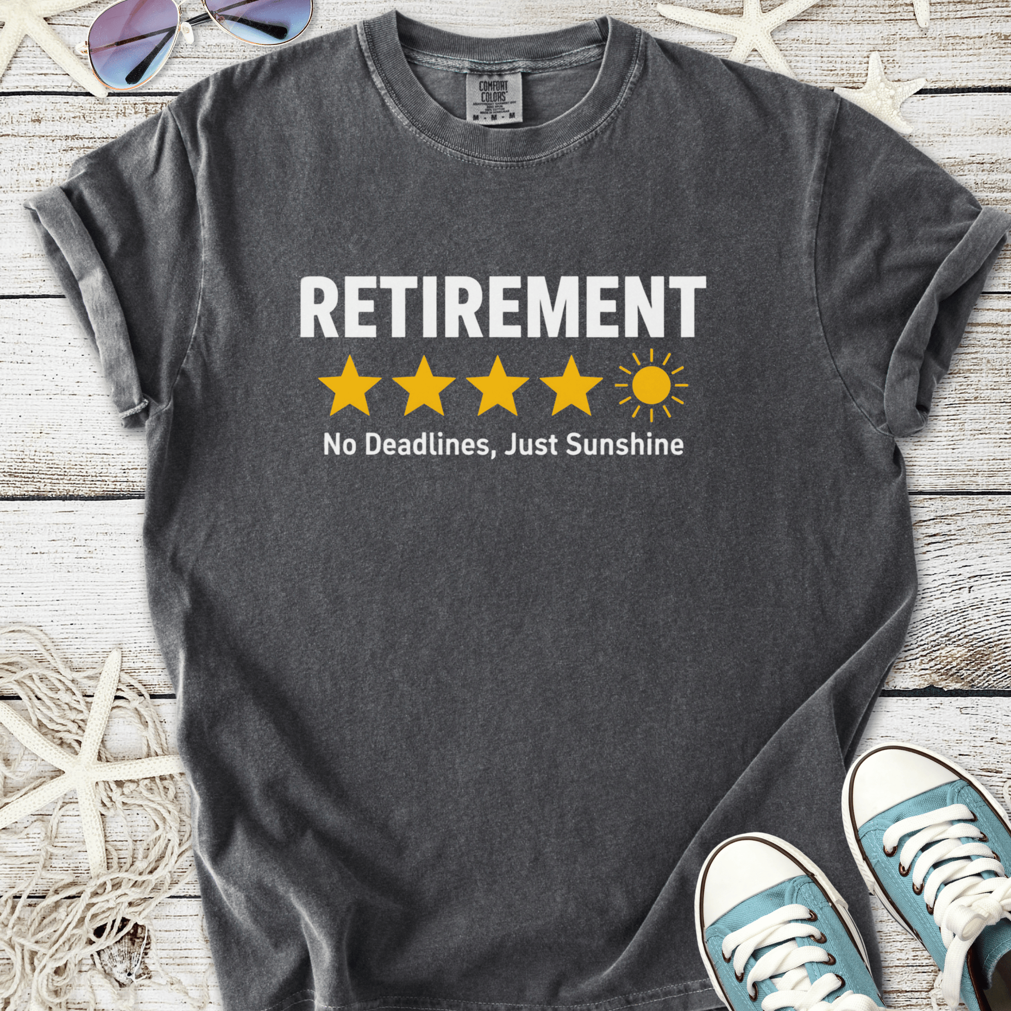 Gray retirement t-shirt with yellow stars and sun graphic, featuring 'No Deadlines, Just Sunshine' slogan.
