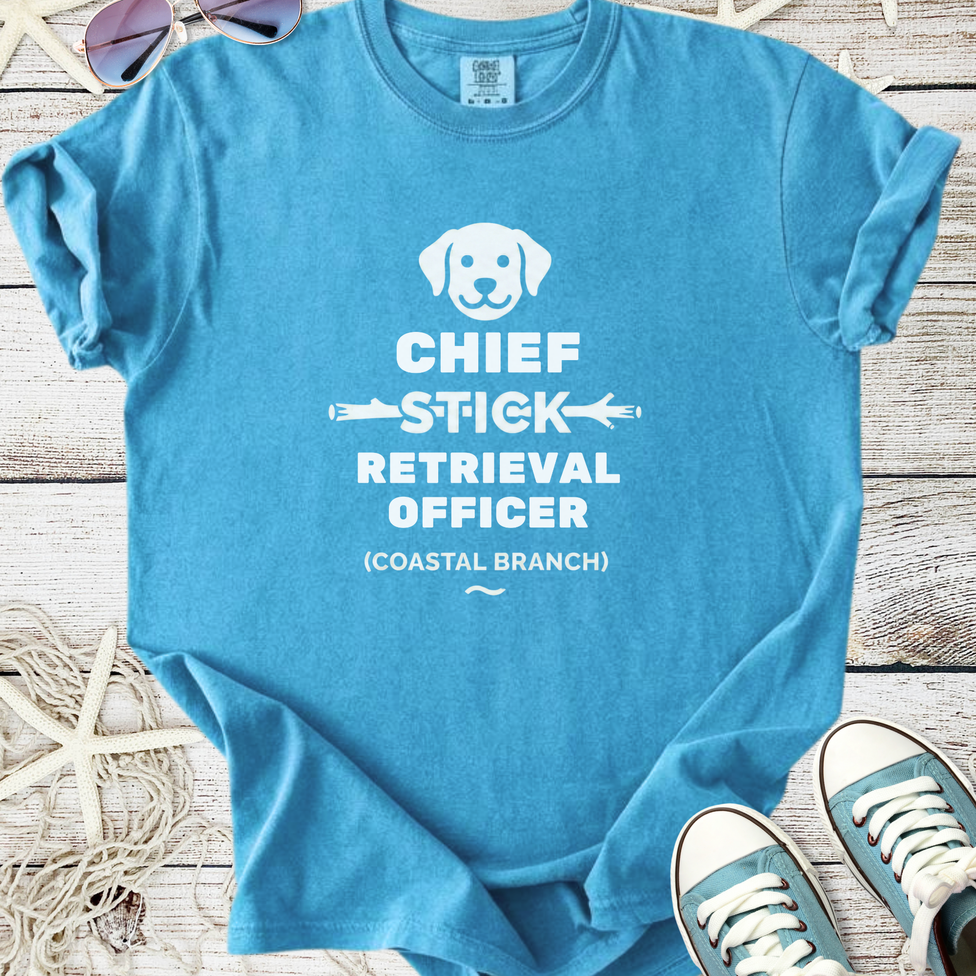 Light blue t-shirt for dog lovers with 'Chief Stick Retrieval Officer' print, perfect for casual wear.